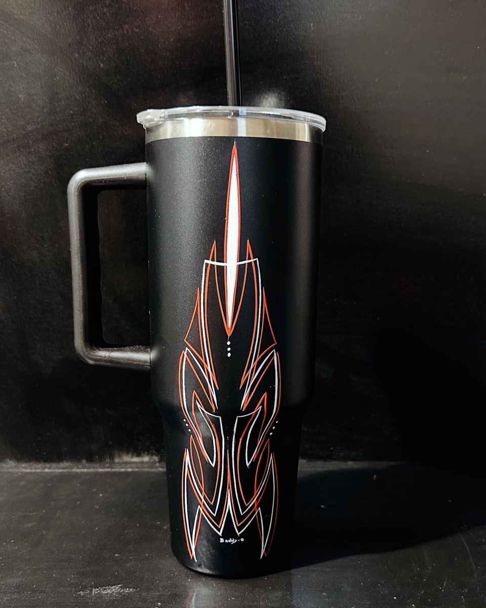 Black tumbler with custom pinstriping